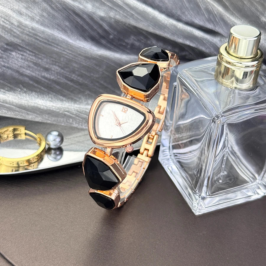 Reloj de cuarzo vanguardista de moda con esfera de patrón solar simple, pedrería brillante de forma irregular y diseño especial para mujer