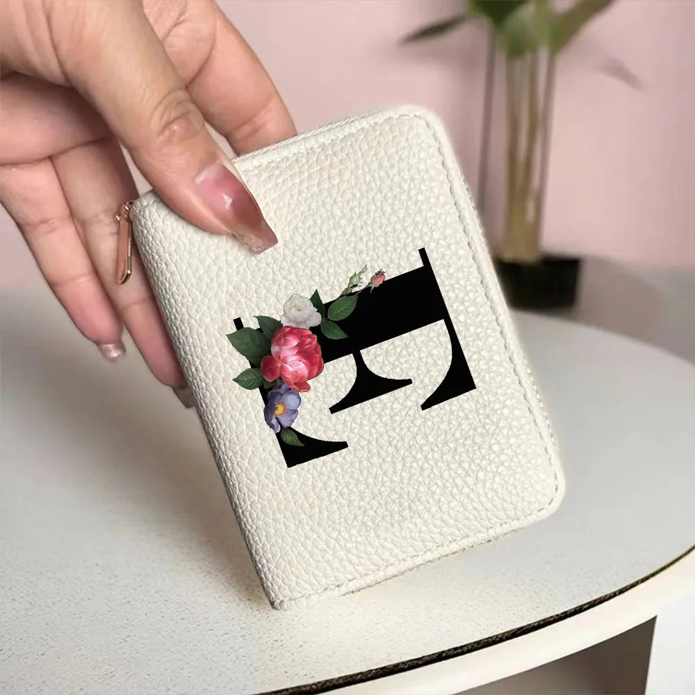 Cartera corta con estampado floral y letras