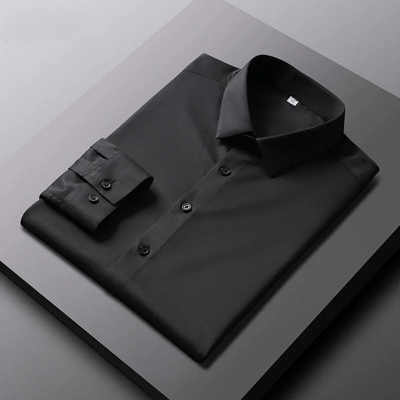Camisa de manga larga de color liso para hombre, informal y a la moda, que no necesita planchado y es resistente a las arrugas, top de negocios