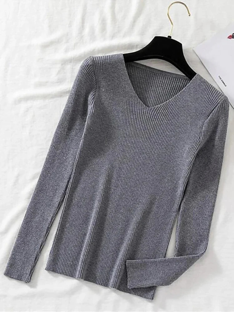 Suéter de mujer nuevo otoño invierno de manga larga jersey básico top de moda cuello en V elástico femenino invierno de punto sólido