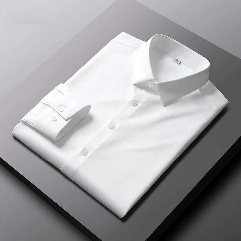 Camisa de manga larga de color liso para hombre, informal y a la moda, que no necesita planchado y es resistente a las arrugas, top de negocios