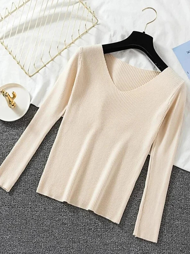 Suéter de mujer nuevo otoño invierno de manga larga jersey básico top de moda cuello en V elástico femenino invierno de punto sólido
