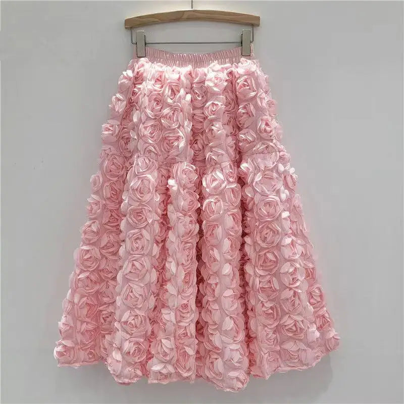Falda para mujer Verano 2025 Versátil Flor tridimensional Falda a media pantorrilla Cintura alta Gran vuelo Moda Faldas largas estilo A
