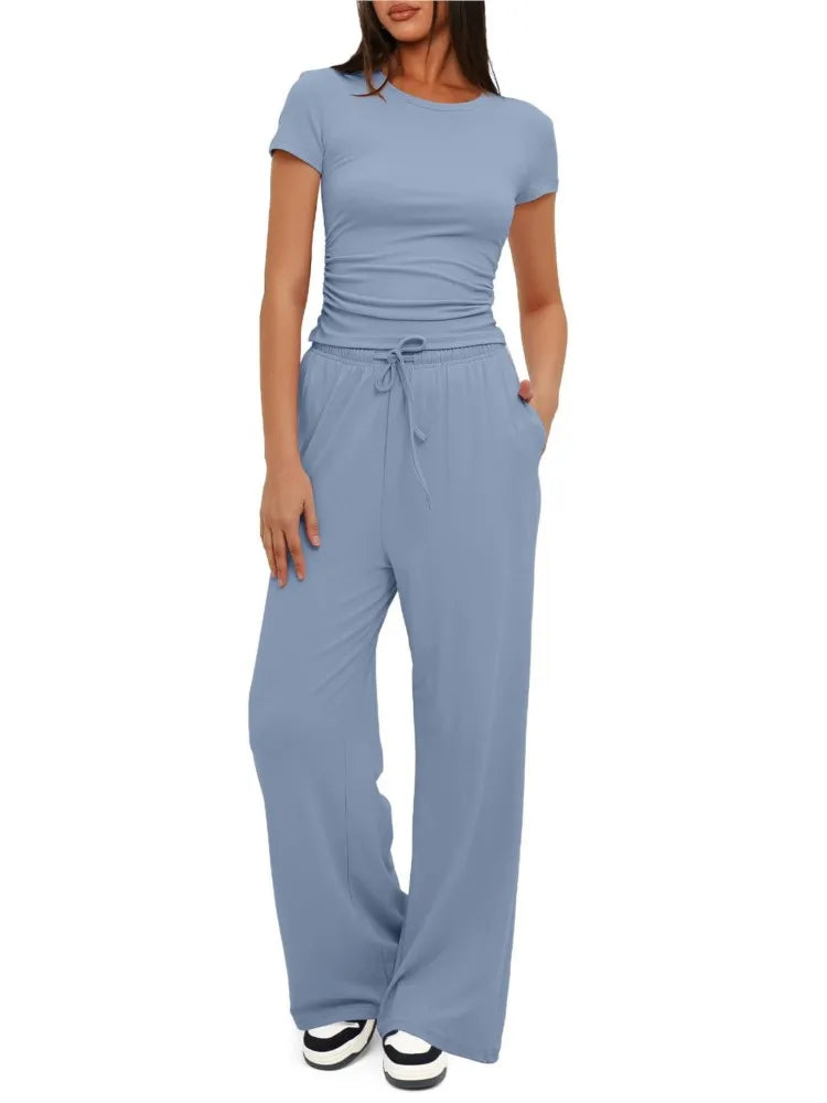 Conjunto de dos piezas de moda para mujer con top plisado de manga corta para comodidad informal y pantalones deportivos de pernera ancha y cintura alta