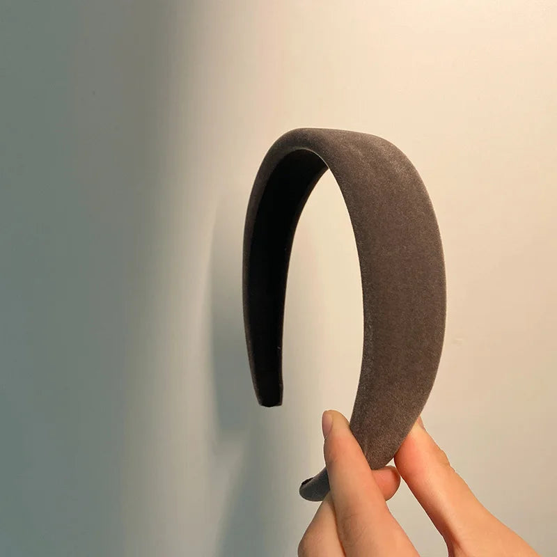 Fløyelspolstret vinterpannebånd
