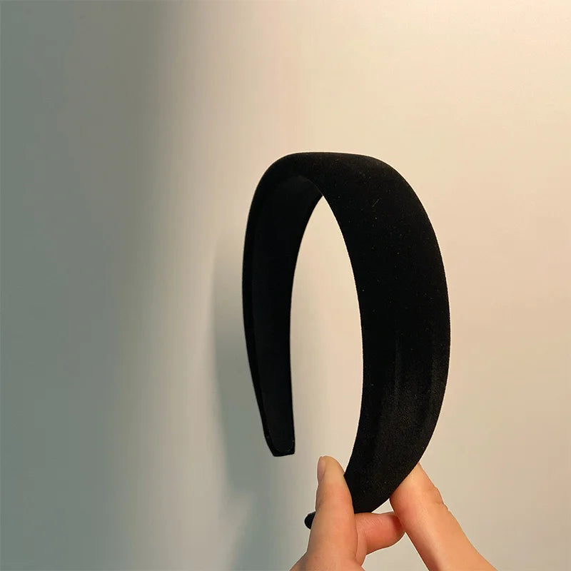 Fløyelspolstret vinterpannebånd