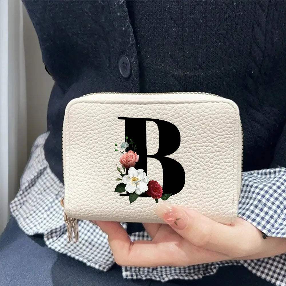 Cartera corta con estampado floral y letras