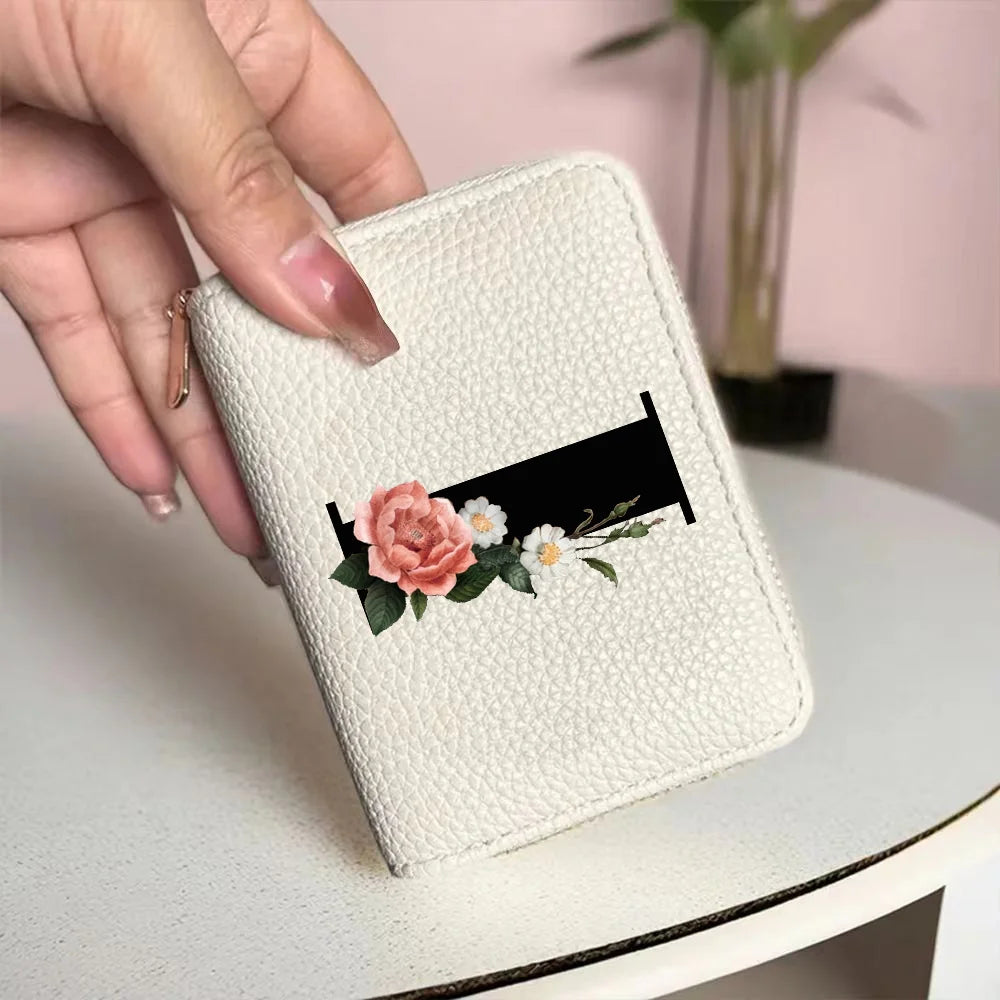 Cartera corta con estampado floral y letras