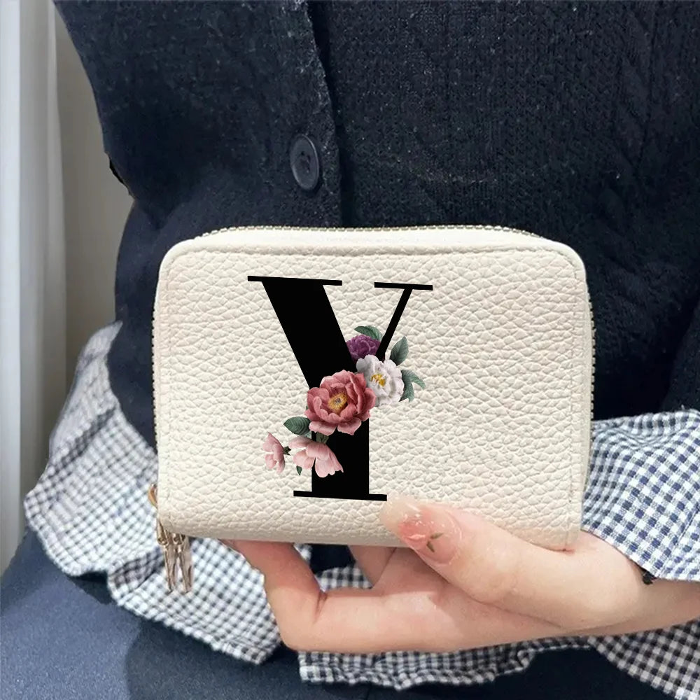 Cartera corta con estampado floral y letras