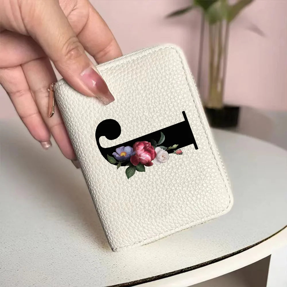Cartera corta con estampado floral y letras