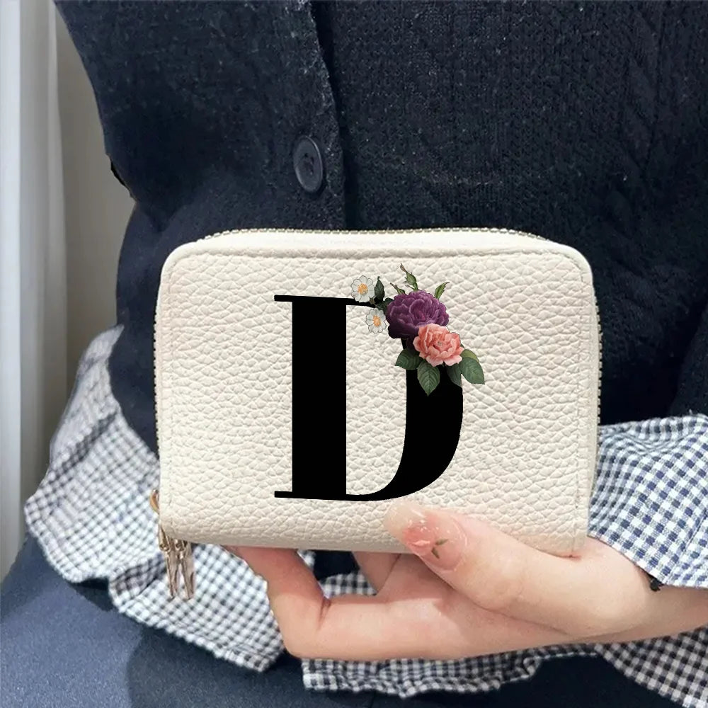 Cartera corta con estampado floral y letras