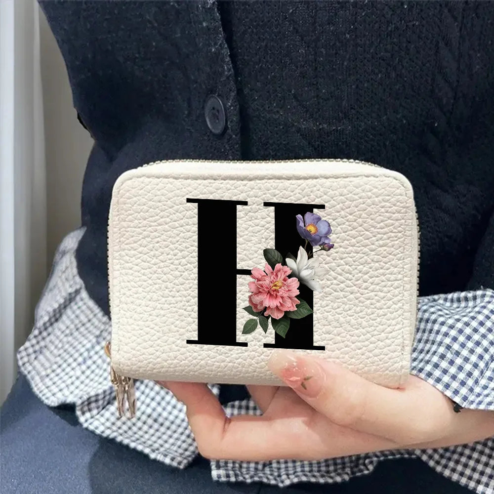 Cartera corta con estampado floral y letras