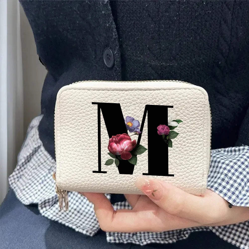 Cartera corta con estampado floral y letras