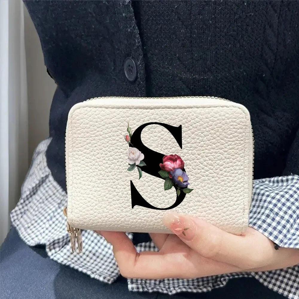 Cartera corta con estampado floral y letras