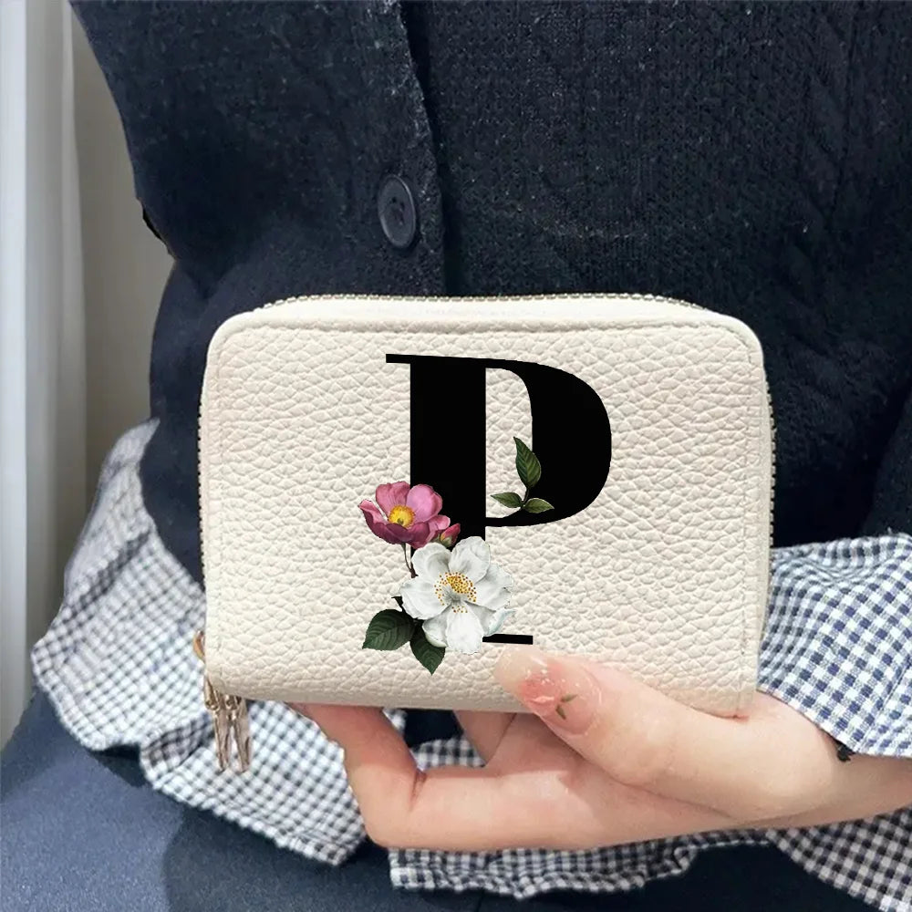 Cartera corta con estampado floral y letras