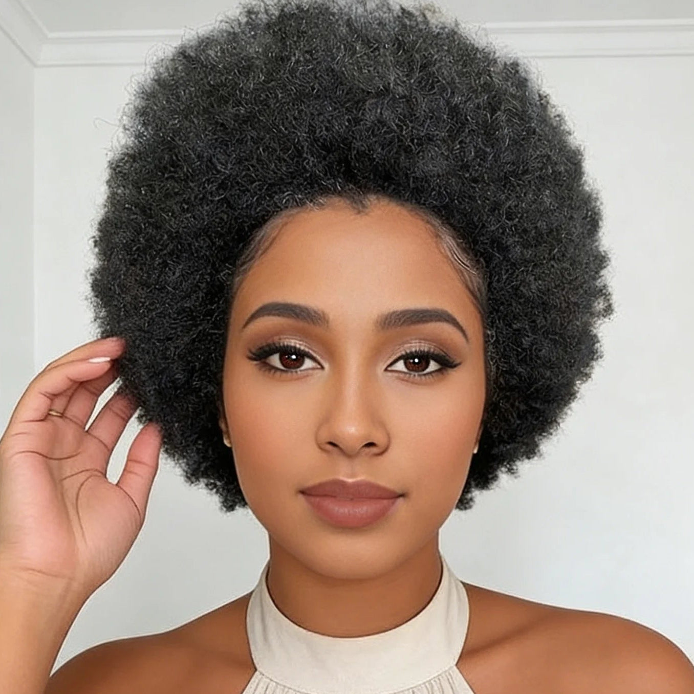 Perruque afro bouclée en forme de chignon (puff)